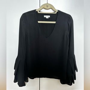 Finn & Grace black long sleeve blouse with fun sleeves